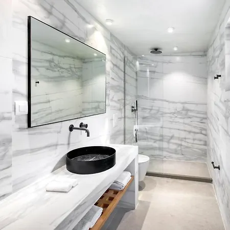 Hotell Panormos Bay Luxury